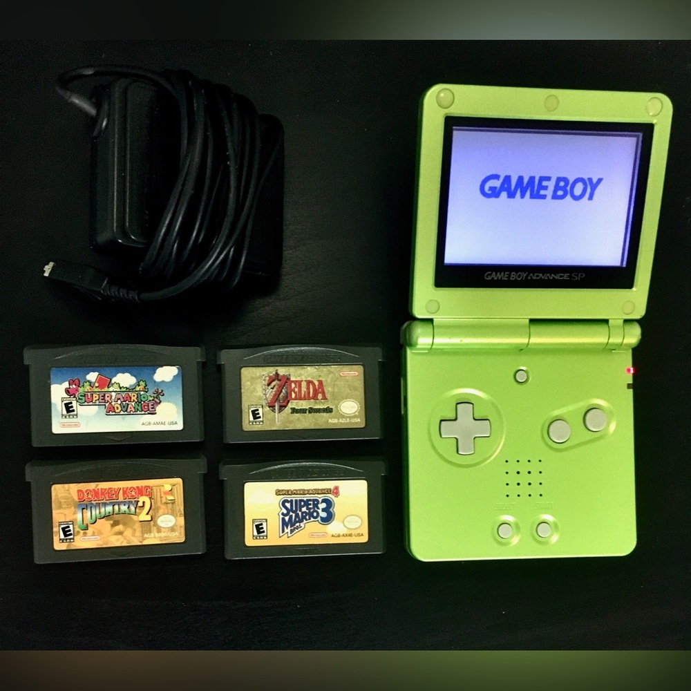 Nintendo Gameboy advance SP with 4 games- Super Mario, Donkey Kong, Zelda